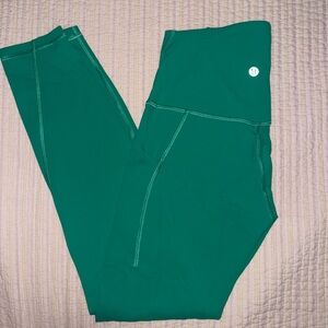 Green Lululemon leggings with pockets